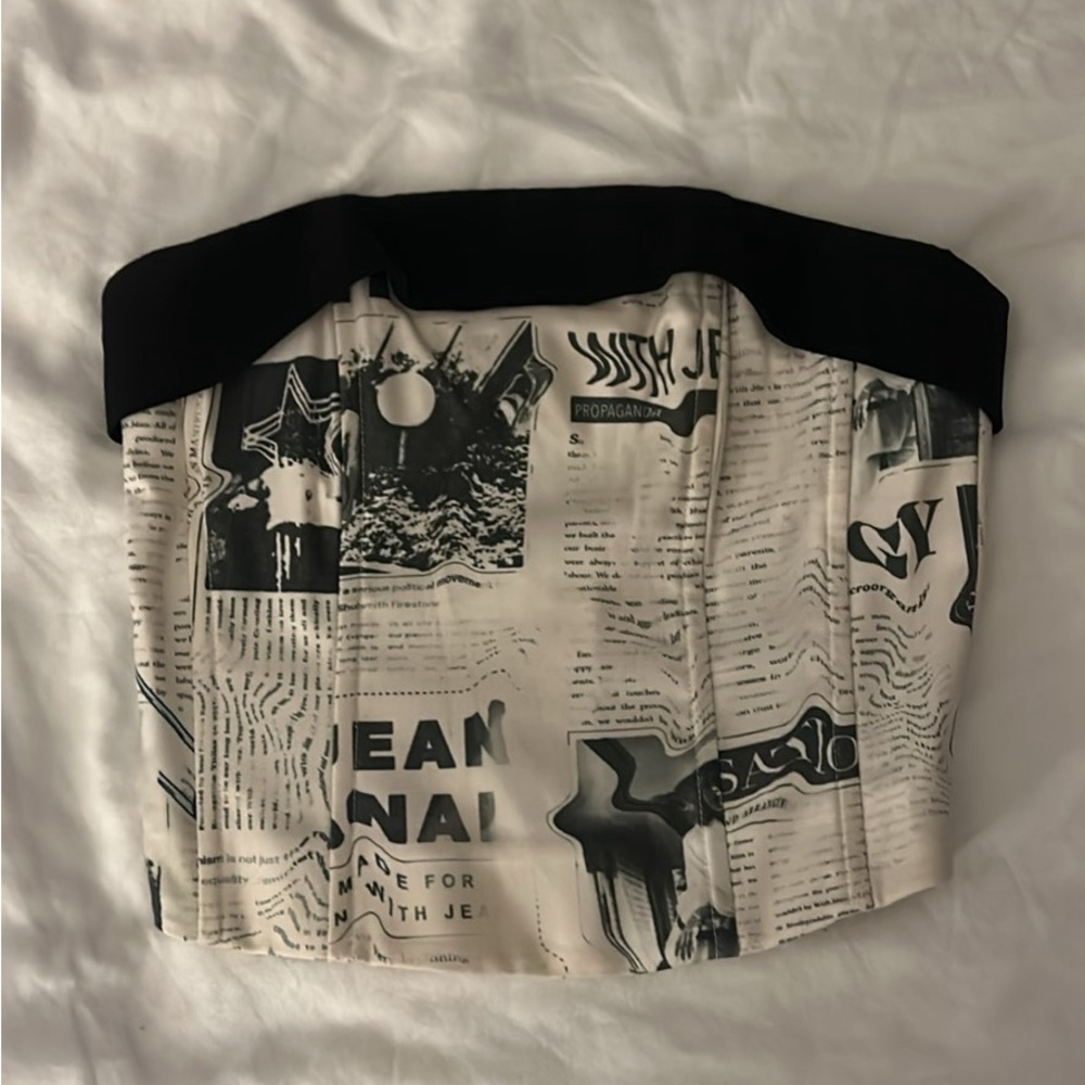With Jean Carla corset in newsprint/ newspaper print